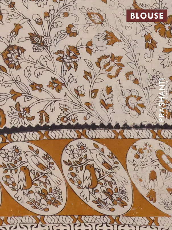 Kalamkari cotton saree cream and dark mustard with allover prints and printed border