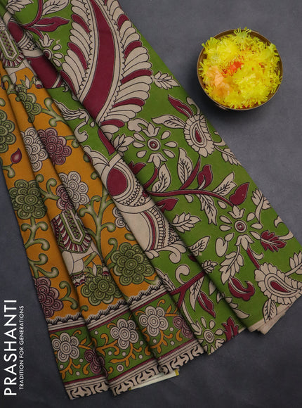 Kalamkari cotton saree mango yellow and sap green with allover prints and printed border