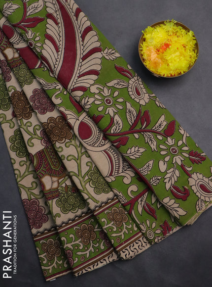 Kalamkari cotton saree beige and sap green with allover prints and printed border