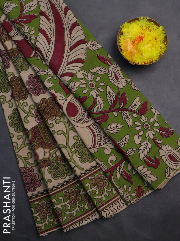 Kalamkari cotton saree beige and sap green with allover prints and printed border