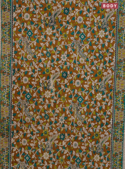 Kalamkari cotton saree mustard yellow and green with allover prints and printed border