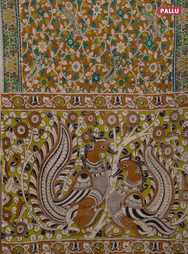 Kalamkari cotton saree mustard yellow and green with allover prints and printed border