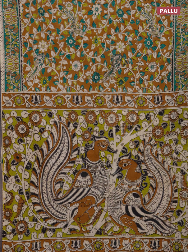 Kalamkari cotton saree mustard yellow and green with allover prints and printed border