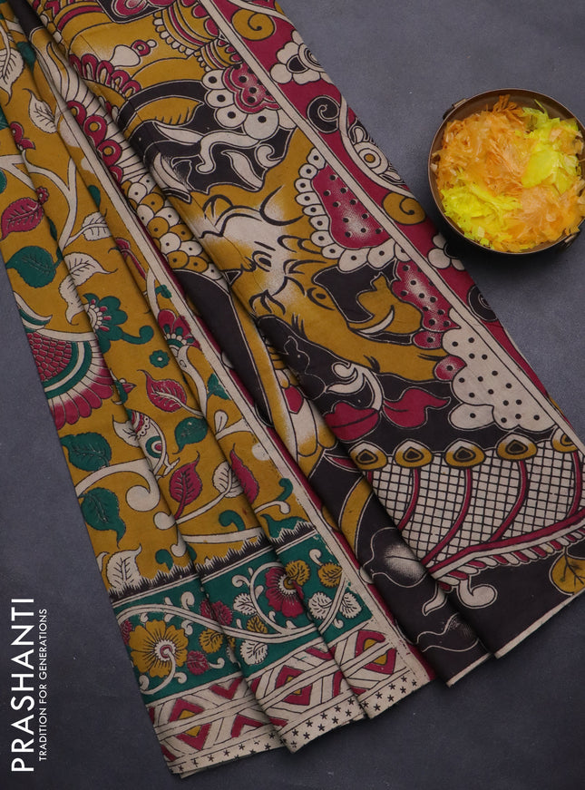 Kalamkari cotton saree yellow and green with allover prints and printed border