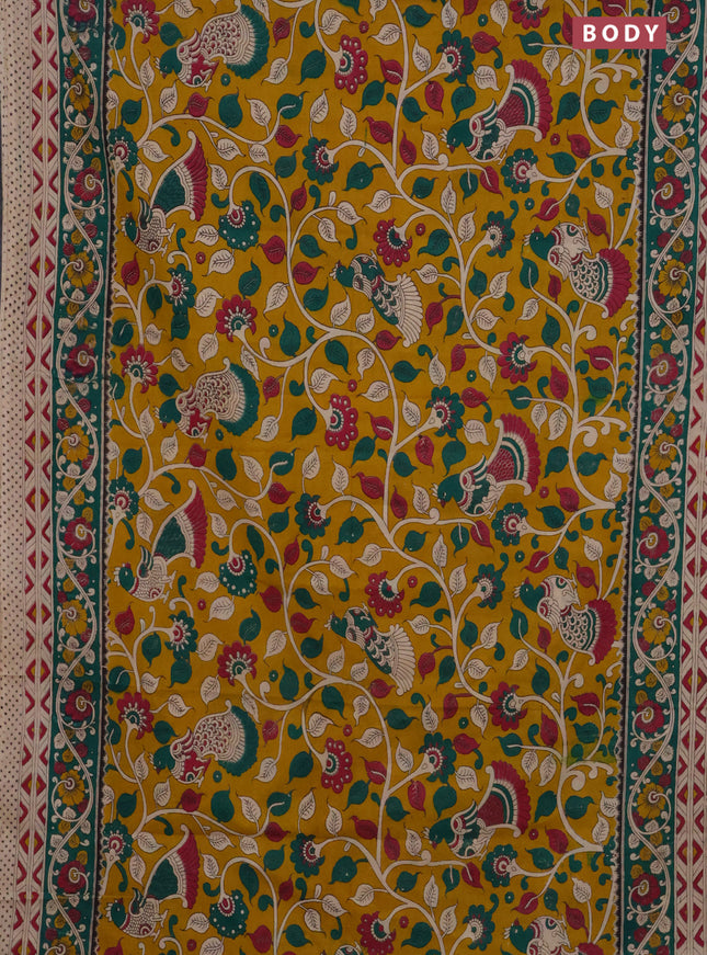 Kalamkari cotton saree yellow and green with allover prints and printed border