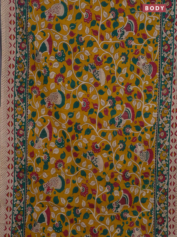 Kalamkari cotton saree yellow and green with allover prints and printed border