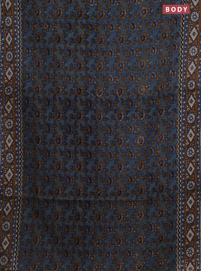 Kalamkari cotton saree pastel bluw and dark mustard with allover prints and printed border