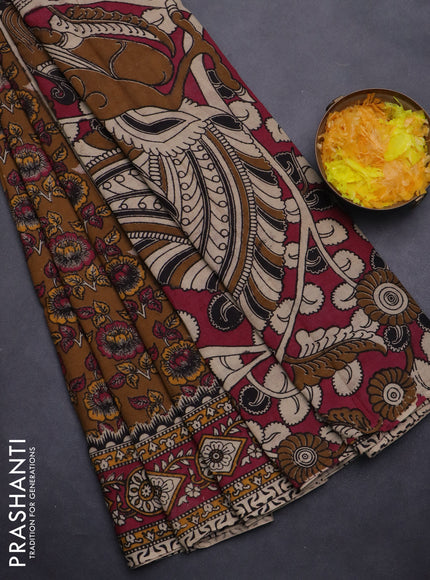 Kalamkari cotton saree dark mustard and dark pink with allover prints and printed border