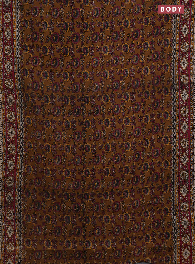 Kalamkari cotton saree dark mustard and dark pink with allover prints and printed border