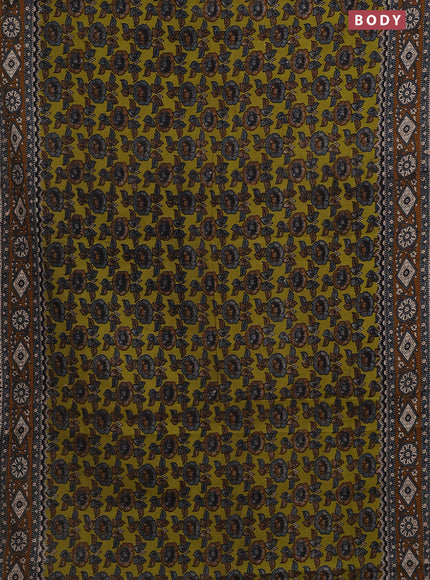 Kalamkari cotton saree mehendi green and brown with allover prints and printed border
