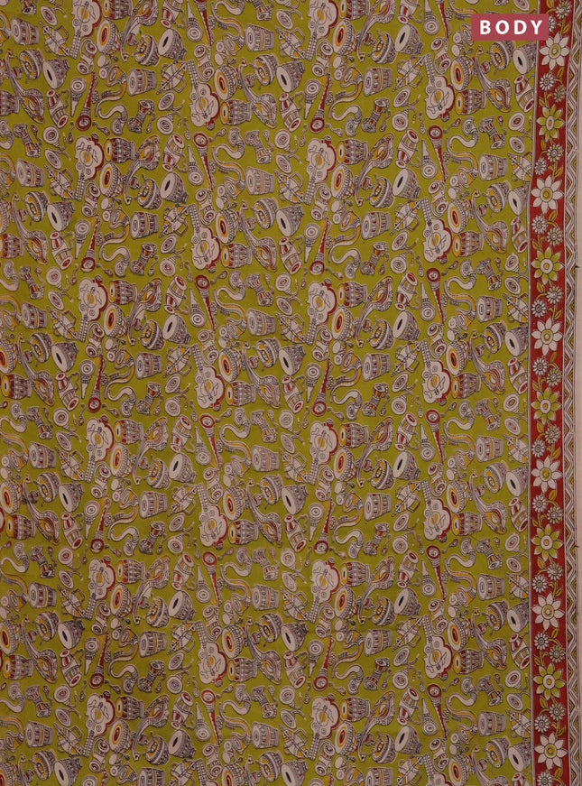 Kalamkari cotton saree light green and maroon with allover musical instrument prints and printed border