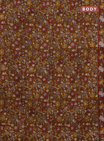 Kalamkari cotton saree dark mustard and red with allover prints and printed border