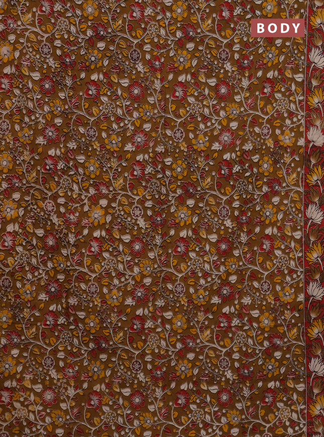 Kalamkari cotton saree dark mustard and red with allover prints and printed border
