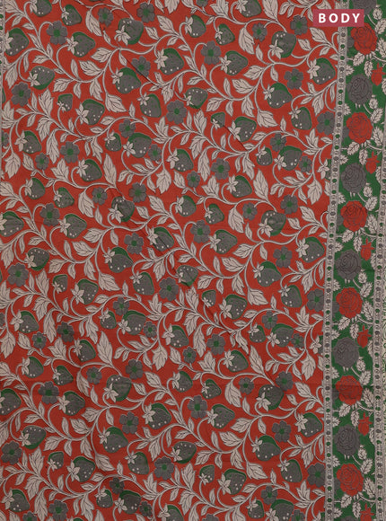 Kalamkari cotton saree orange and green with allover prints and printed border