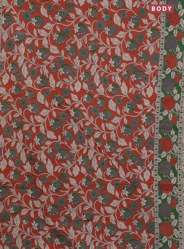 Kalamkari cotton saree orange and green with allover prints and printed border