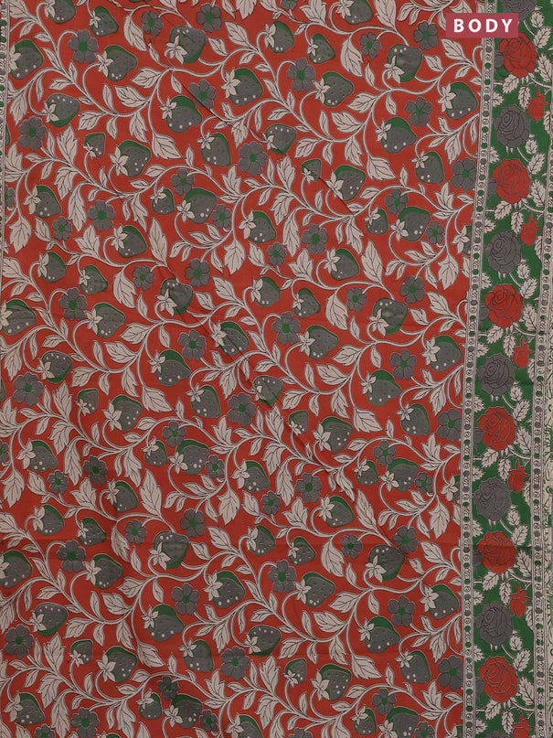 Kalamkari cotton saree orange and green with allover prints and printed border