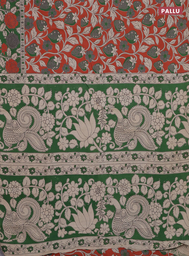 Kalamkari cotton saree orange and green with allover prints and printed border
