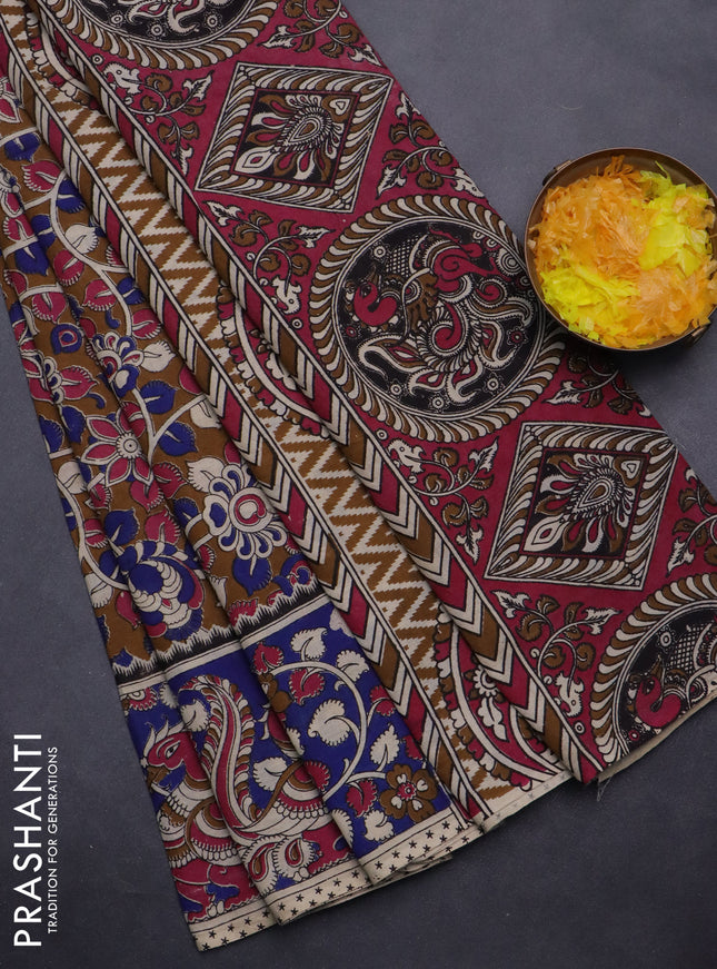 Kalamkari cotton saree dark mustard and blue with allover prints and printed border