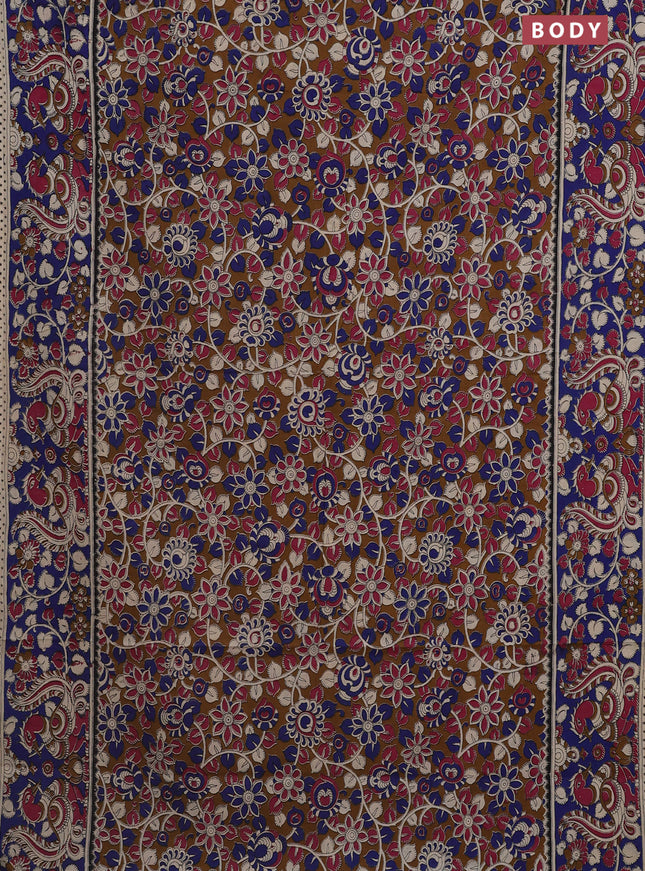 Kalamkari cotton saree dark mustard and blue with allover prints and printed border