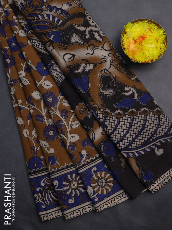 Kalamkari cotton saree dark mustard and blue with allover prints and printed border
