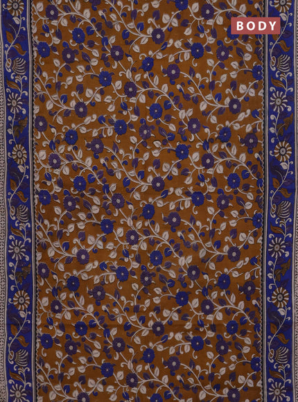 Kalamkari cotton saree dark mustard and blue with allover prints and printed border