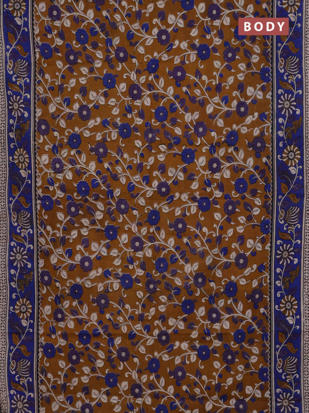 Kalamkari cotton saree dark mustard and blue with allover prints and printed border