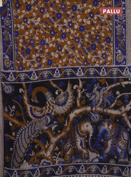 Kalamkari cotton saree dark mustard and blue with allover prints and printed border