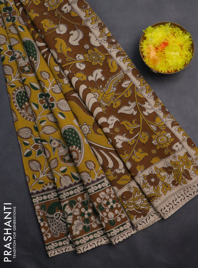Kalamkari cotton saree yellow and dark mustard with allover prints and printed border
