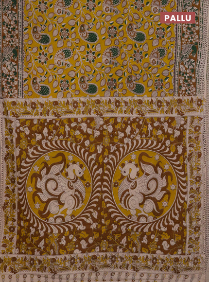 Kalamkari cotton saree yellow and dark mustard with allover prints and printed border
