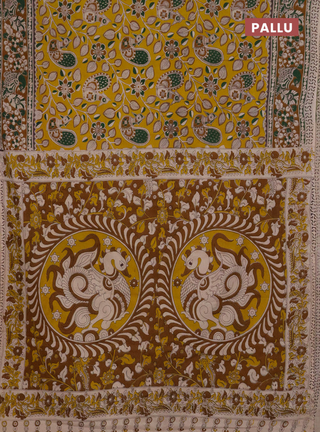 Kalamkari cotton saree yellow and dark mustard with allover prints and printed border