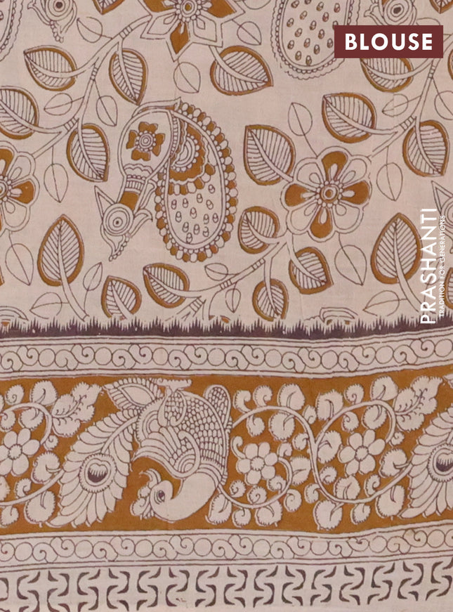 Kalamkari cotton saree yellow and dark mustard with allover prints and printed border