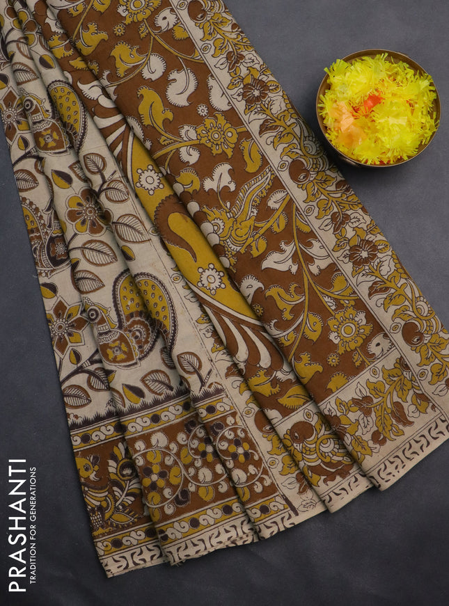 Kalamkari cotton saree cream and dark mustard with allover prints and printed border