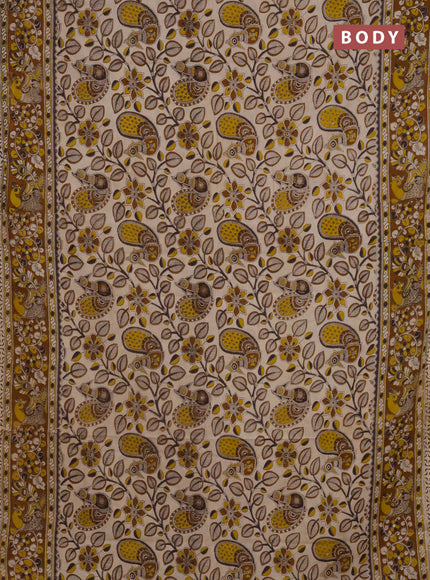 Kalamkari cotton saree cream and dark mustard with allover prints and printed border