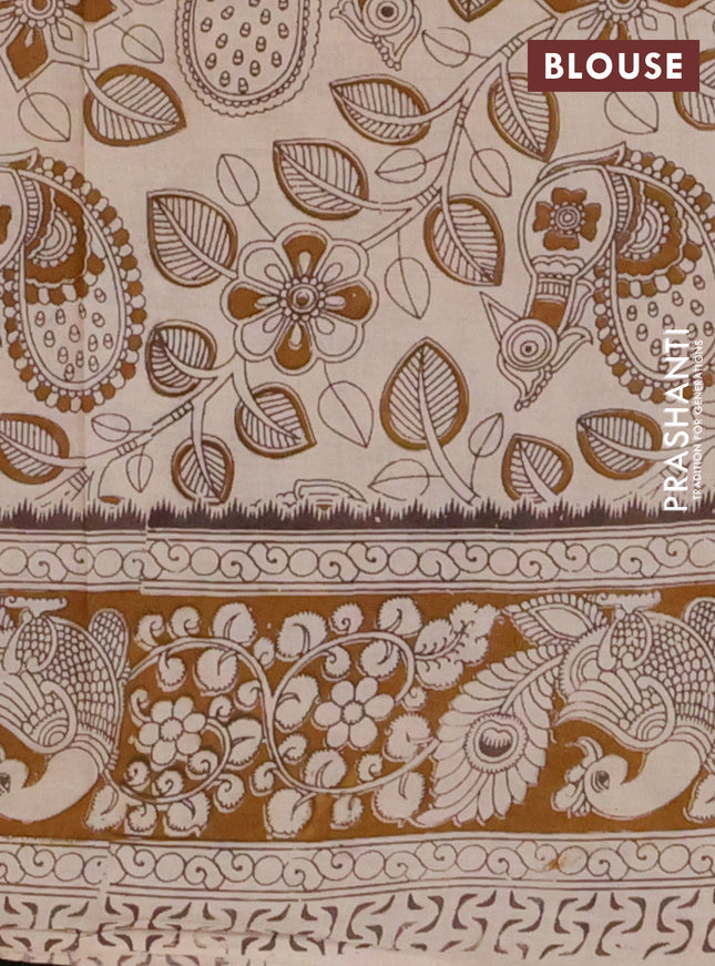 Kalamkari cotton saree cream and dark mustard with allover prints and printed border