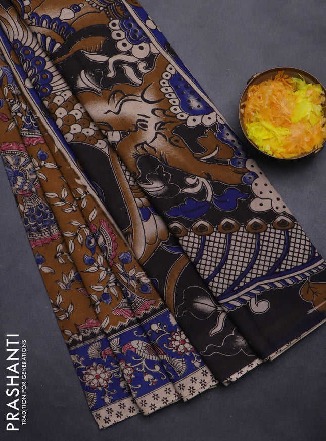 Kalamkari cotton saree dark mustard and blue with allover prints and printed border