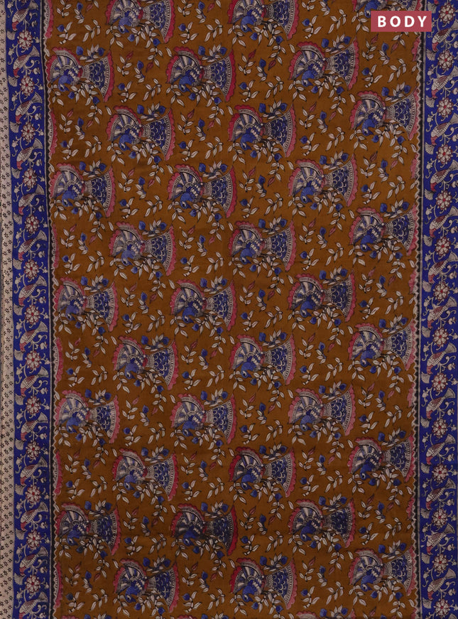 Kalamkari cotton saree dark mustard and blue with allover prints and printed border