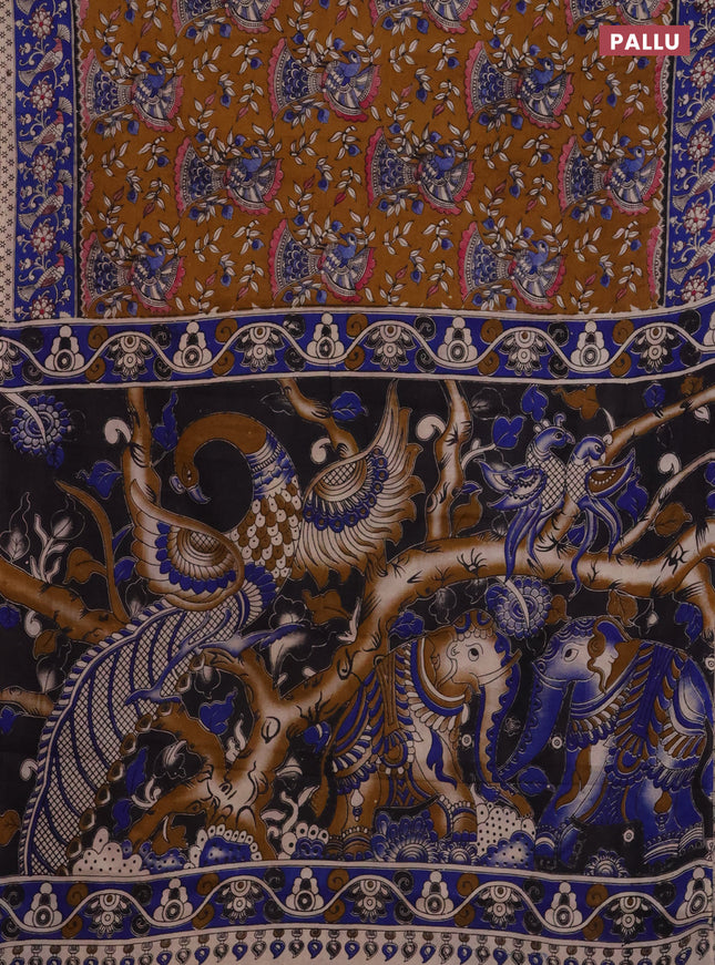 Kalamkari cotton saree dark mustard and blue with allover prints and printed border