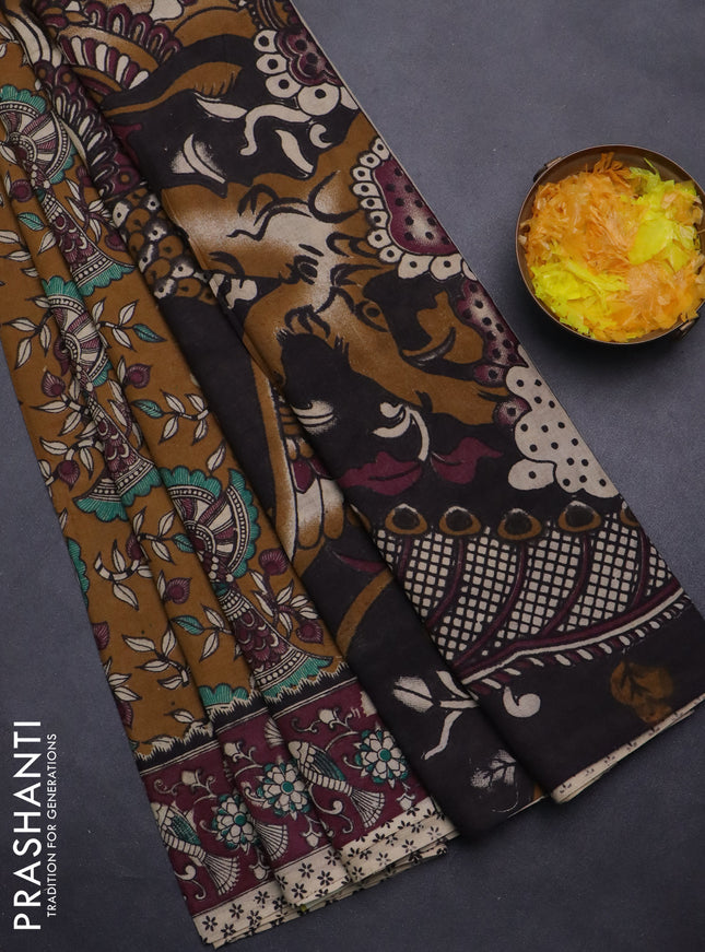 Kalamkari cotton saree dark mustard and wine shade with allover prints and printed border