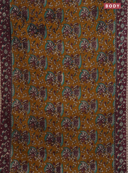 Kalamkari cotton saree dark mustard and wine shade with allover prints and printed border