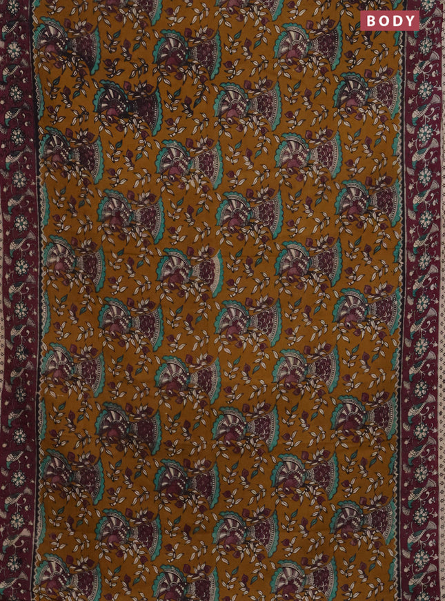 Kalamkari cotton saree dark mustard and wine shade with allover prints and printed border