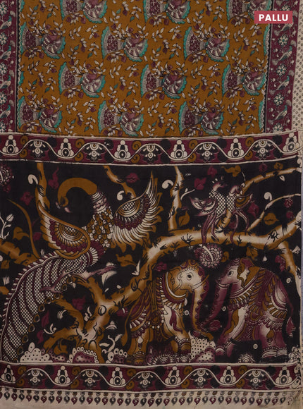 Kalamkari cotton saree dark mustard and wine shade with allover prints and printed border