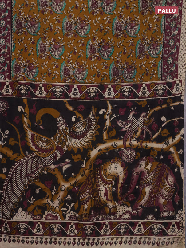 Kalamkari cotton saree dark mustard and wine shade with allover prints and printed border