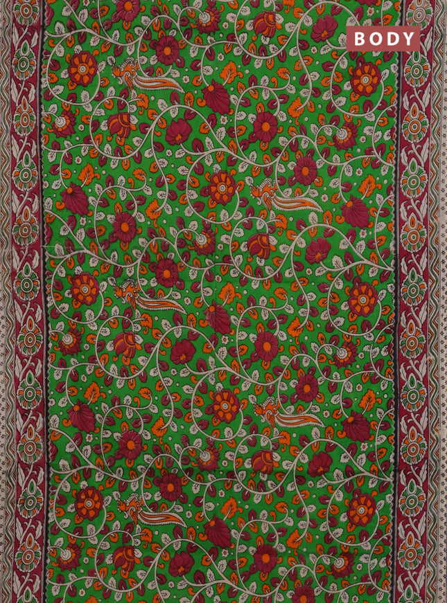 Kalamkari cotton saree light green and dark magenta pink with allover prints and printed border