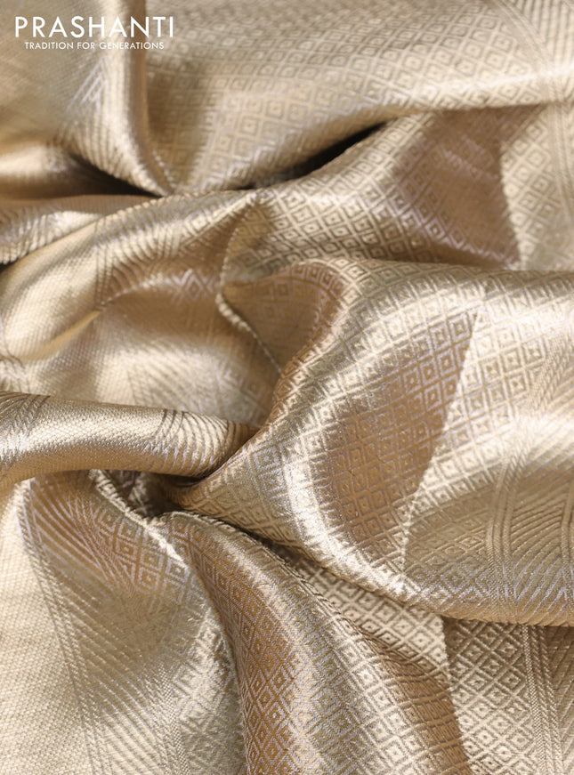 Banarasi tissue silk saree gold and maroon with allover zari woven brocade weaves and zari woven border