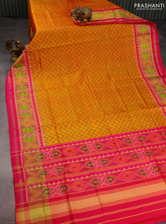 Rajkot patola silk saree mango yellow and pink with allover zig zag ikat weaves and zari woven ikat border