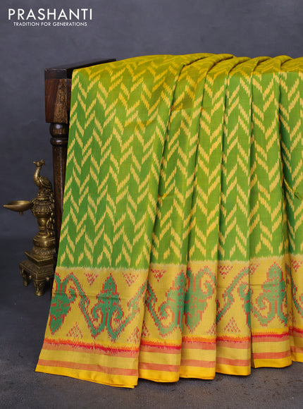 Rajkot patola silk saree green and yellow with allover ikat weaves and zari woven ikat border