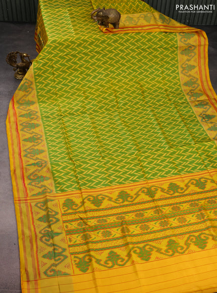 Rajkot patola silk saree green and yellow with allover ikat weaves and zari woven ikat border