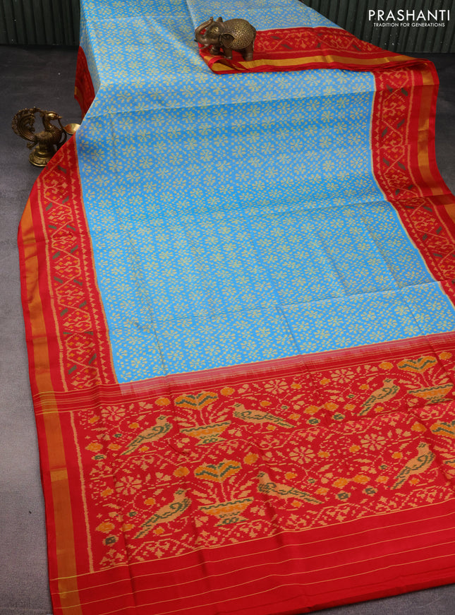 Rajkot patola silk saree blue and red with allover ikat weaves and ikat woven ikat border