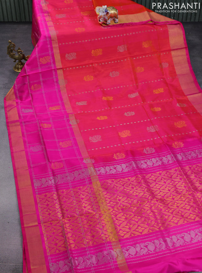 Pure uppada silk saree dual shade of pinkish orange and pink with allover zari weaves and long zari woven checked border