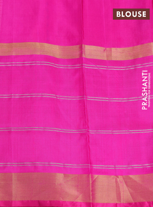 Pure uppada silk saree dual shade of pinkish orange and pink with allover zari weaves and long zari woven checked border